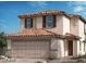 Two-story house with Spanish-style tile roof and attached garage at 6905 Cottage Vista Ave, Las Vegas, NV 89113