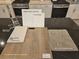 Kitchen design samples featuring upgraded cabinets, quartz countertops, and vinyl plank flooring at 6905 Cottage Vista Ave, Las Vegas, NV 89113