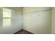 Walk-in closet with wall-mounted storage shelves, offering organized storage solutions at 7308 Davenbury St, Las Vegas, NV 89113