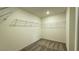 Walk-in closet with carpeted floor and white wire shelving at 7308 Davenbury St, Las Vegas, NV 89113
