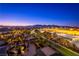Night aerial view showcasing beautifully lit community and landscape at 9101 Alta Dr # 505, Las Vegas, NV 89145