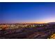 Scenic sunset aerial view of the neighborhood and city skyline at 9101 Alta Dr # 505, Las Vegas, NV 89145