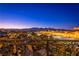 Night view from balcony showcasing city lights and mountains at 9101 Alta Dr # 505, Las Vegas, NV 89145