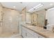 Bathroom with walk-in shower and marble vanity at 9101 Alta Dr # 505, Las Vegas, NV 89145