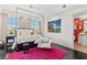 Main bedroom with four-poster bed and city views at 9101 Alta Dr # 505, Las Vegas, NV 89145