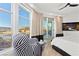 Modern bedroom with large windows offering city views at 9101 Alta Dr # 505, Las Vegas, NV 89145