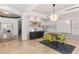 Casual dining area with green chairs and city views at 9101 Alta Dr # 505, Las Vegas, NV 89145