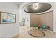 Elegant entryway with a circular seating area and modern art at 9101 Alta Dr # 505, Las Vegas, NV 89145