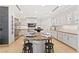 Modern kitchen with granite island and stainless steel appliances at 9101 Alta Dr # 505, Las Vegas, NV 89145