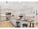 Gourmet kitchen with granite island, stainless steel appliances, and white cabinetry at 9101 Alta Dr # 505, Las Vegas, NV 89145