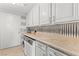 Bright laundry room, features washer, dryer, and ample cabinetry at 9101 Alta Dr # 505, Las Vegas, NV 89145