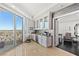 Elegant wet bar with glass cabinets and city views at 9101 Alta Dr # 505, Las Vegas, NV 89145