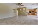 Open floor plan living room with kitchen view at 9893 Cove Haven Ct, Las Vegas, NV 89178