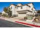 Two-story house with attached garage, landscaping, and a driveway at 1336 Allegheny Moon Ter # 103, Henderson, NV 89002