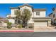 Two-story house with attached garage and landscaping at 1336 Allegheny Moon Ter # 103, Henderson, NV 89002