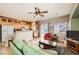 Open kitchen with breakfast bar, light wood cabinets, and island at 1336 Allegheny Moon Ter # 103, Henderson, NV 89002
