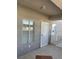 Inviting entryway with tiled flooring and a security door at 1726 N Jones Blvd, Las Vegas, NV 89108