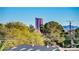 Aerial view showcasing the property's surroundings and distant city skyline at 1964 Westwind Rd, Las Vegas, NV 89146