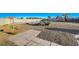 Landscaped backyard with gravel, stone pathway, and desert plants at 1964 Westwind Rd, Las Vegas, NV 89146