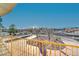 Backyard view from a balcony showcasing the property's landscaping and driveway at 1964 Westwind Rd, Las Vegas, NV 89146