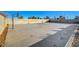 Spacious backyard basketball court with surrounding block wall at 1964 Westwind Rd, Las Vegas, NV 89146