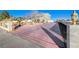 House exterior with gated entrance and paved driveway at 1964 Westwind Rd, Las Vegas, NV 89146