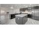 Modern kitchen with granite countertops and stainless steel appliances at 1964 Westwind Rd, Las Vegas, NV 89146