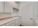 Laundry room with cabinets and a sink at 1964 Westwind Rd, Las Vegas, NV 89146