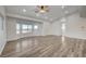 Bright and airy living area with wood-look floors and a view at 1964 Westwind Rd, Las Vegas, NV 89146