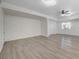 Large living room with vinyl plank floors and ceiling fan at 1964 Westwind Rd, Las Vegas, NV 89146
