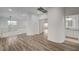 Bright upstairs hallway with wood-look floors, leading to bedrooms and bath at 1964 Westwind Rd, Las Vegas, NV 89146