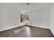 Bright bedroom featuring hardwood floors and a large window at 2114 Inverness Dr, Henderson, NV 89074