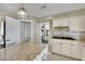 Kitchen with granite countertop island and walk-in pantry at 2114 Inverness Dr, Henderson, NV 89074