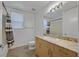 Bathroom featuring tiled floors, a large vanity, and a shower-tub combination at 26 E Serene Ave # 124, Las Vegas, NV 89123