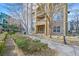 Exterior pathway leads to buildings, showcasing meticulous landscaping and various apartment features at 26 E Serene Ave # 124, Las Vegas, NV 89123