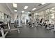 Spacious gym includes weight machines, free weights, and ample natural light from large windows at 26 E Serene Ave # 124, Las Vegas, NV 89123