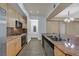Well-appointed kitchen with stainless steel appliances, granite countertops, and ample storage at 26 E Serene Ave # 124, Las Vegas, NV 89123