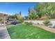 Large backyard with artificial turf and sitting area at 2875 Skowhegan Dr, Henderson, NV 89074