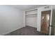 Neutral bedroom featuring built in closet space and gray carpet at 2900 Marlin Ave, Las Vegas, NV 89101