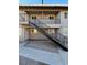 Two-story building with exterior stairs and gated entrance at 2900 Marlin Ave, Las Vegas, NV 89101