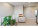 Upstairs hallway with seating area and plants at 3034 Scenic Rhyme Ave, Henderson, NV 89044