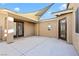 Covered patio with concrete flooring and shade sail at 4571 Plum Island Ct, Las Vegas, NV 89147