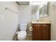 Bathroom with toilet, vanity, and mirror at 4571 Plum Island Ct, Las Vegas, NV 89147