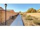 Paved pathway meanders through a well-maintained community at 4571 Plum Island Ct, Las Vegas, NV 89147