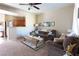 Spacious living room with comfortable sofas and a coffee table at 4625 Centisimo Dr # 202, North Las Vegas, NV 89084