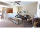 Comfortable living room with view into the kitchen, offering a relaxed and inviting atmosphere at 4625 Centisimo Dr # 202, North Las Vegas, NV 89084