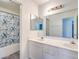 Bathroom with double vanity and shower/tub combo at 5059 Shadow Boxer Ct, Las Vegas, NV 89142