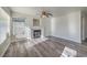 Spacious living room with fireplace and hardwood floors at 5059 Shadow Boxer Ct, Las Vegas, NV 89142