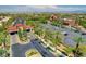 Aerial view of a beautifully landscaped community entrance and surrounding parking, showcasing a vibrant, well-maintained area at 5201 Progresso St, Las Vegas, NV 89135