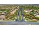 Expansive aerial view of a well-maintained community, highlighting lush landscaping, palm trees, and beautiful streetscapes at 5201 Progresso St, Las Vegas, NV 89135